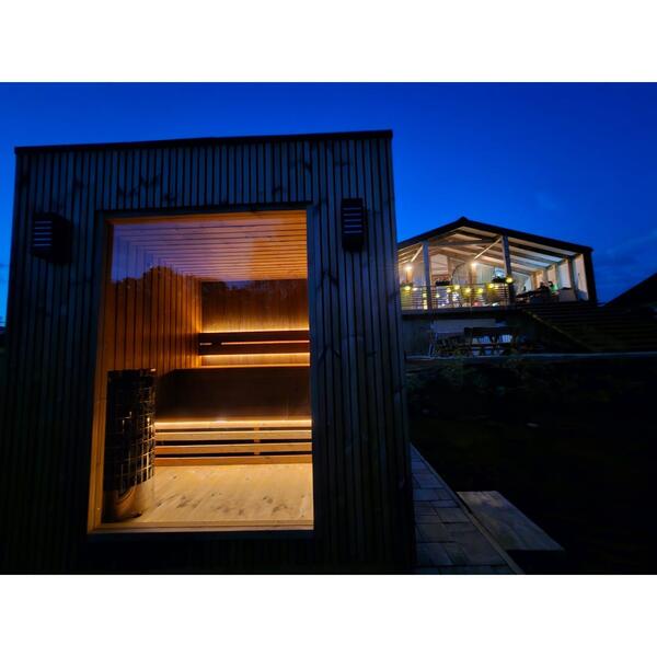 Sauna house at night